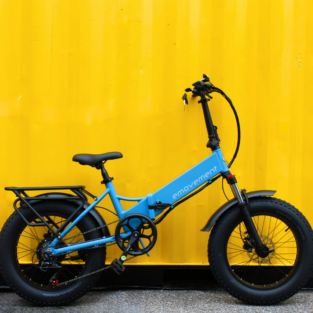 E-MOVEMENT Pixie Pastel Folding Electric Bike 500W Yellow wall